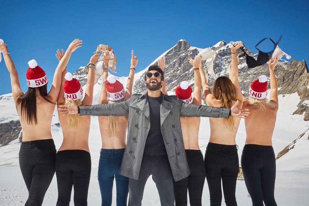 Ranveer Singh strikes a pose with topless girls